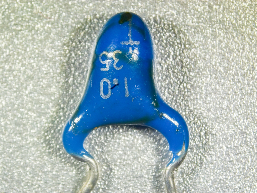 SX-70-era capacitor